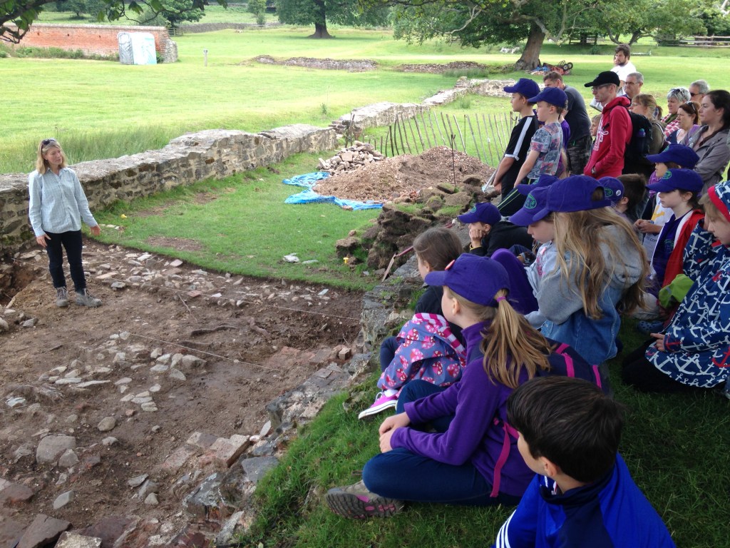 Children getting a site tour of the University of Leicester's excavations at Bradgate Park.